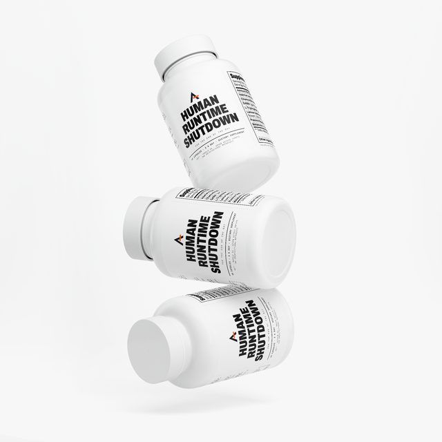 Three bottles of Human Runtime Shutdown™ balanced one on another, their labels turned different ways.